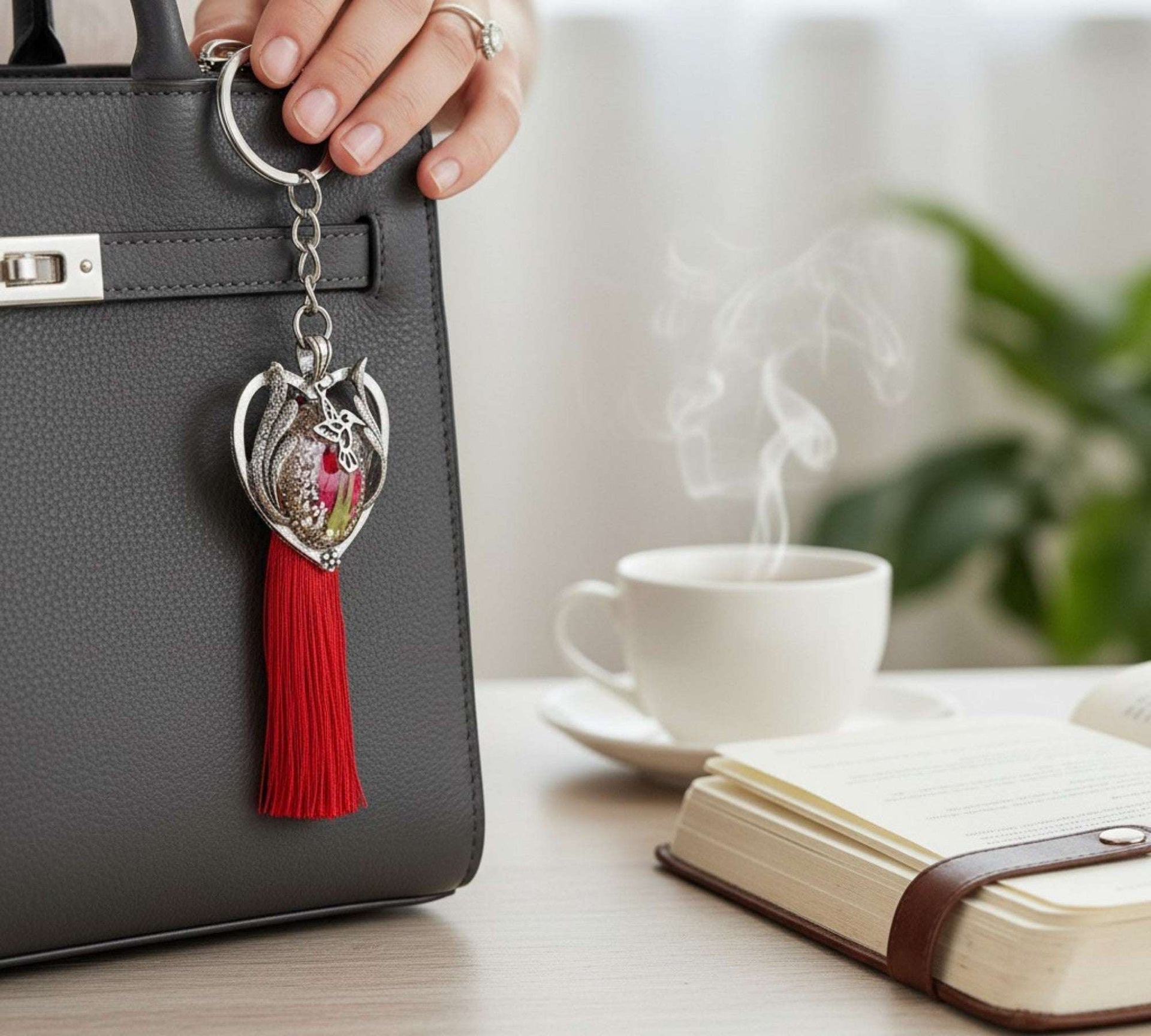 moon bag charm on black handbag