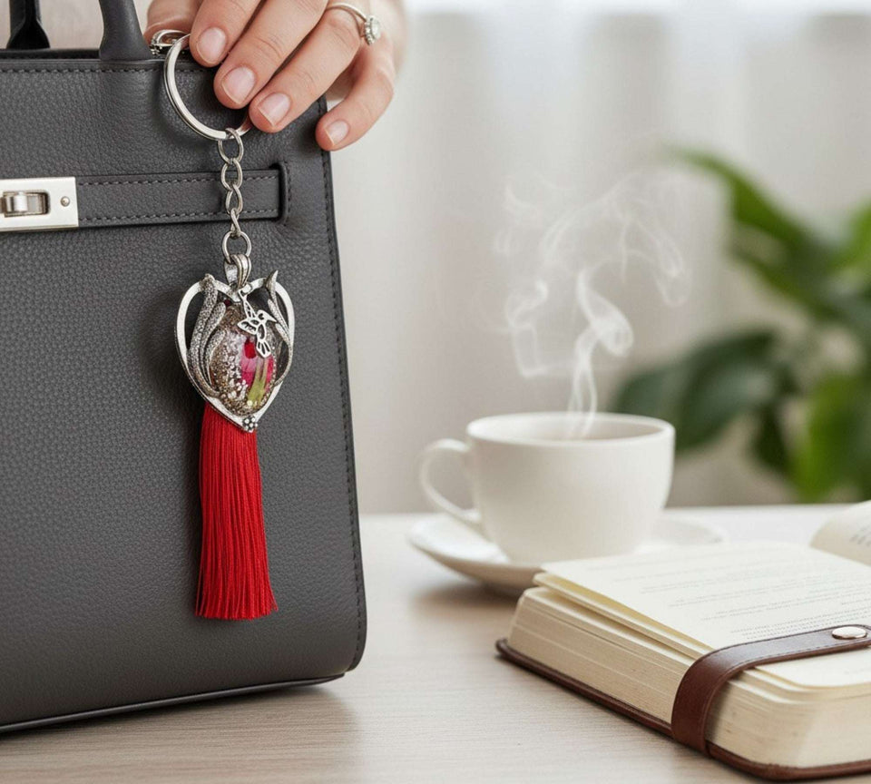 moon bag charm on black handbag