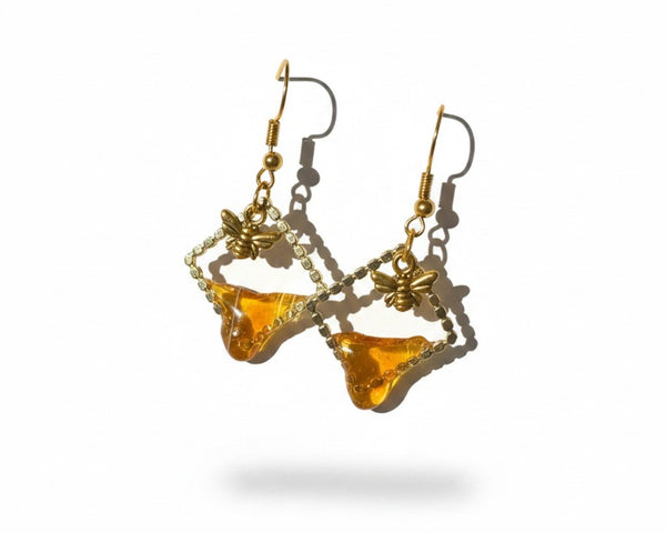 Handmade honey bee drip earrings with gold bee charm & hypoallergenic hooks. One of a kind, made in Cold Lake, Alberta.
