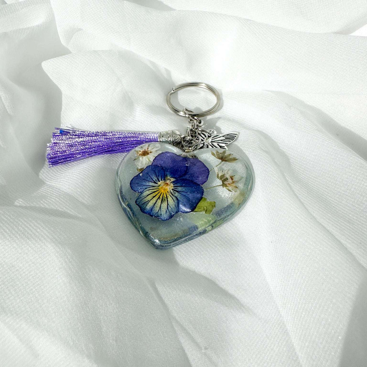 Keychain Fluttering Heart: Pansy Resin Keychain with Butterfly Charm