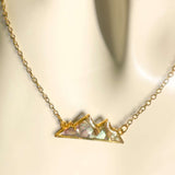 Handmade Gold Mountain Pendant Necklace with Northern Lights