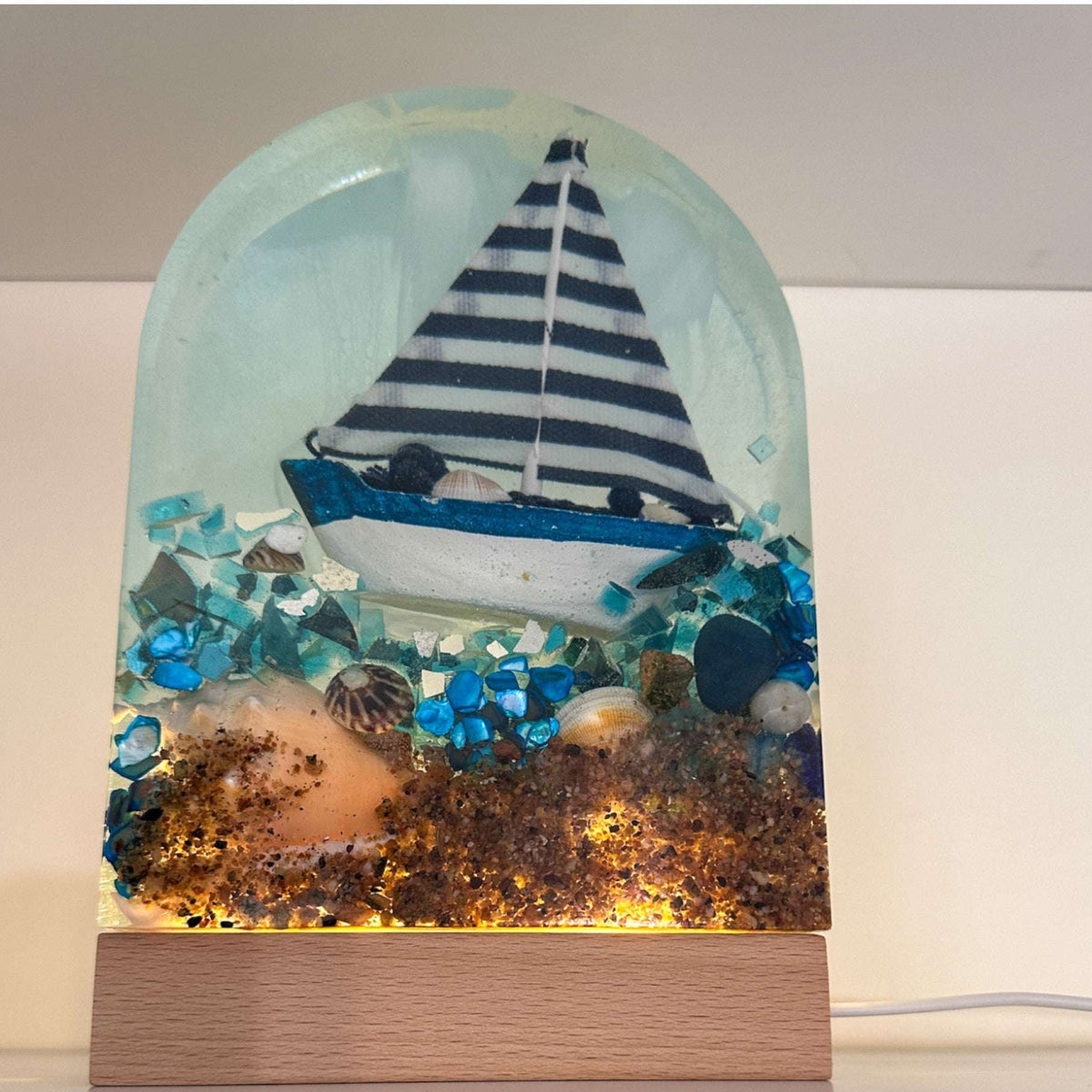 Handmade Resin Sailboat Sculpture – A Tranquil Ocean Scene Illuminated