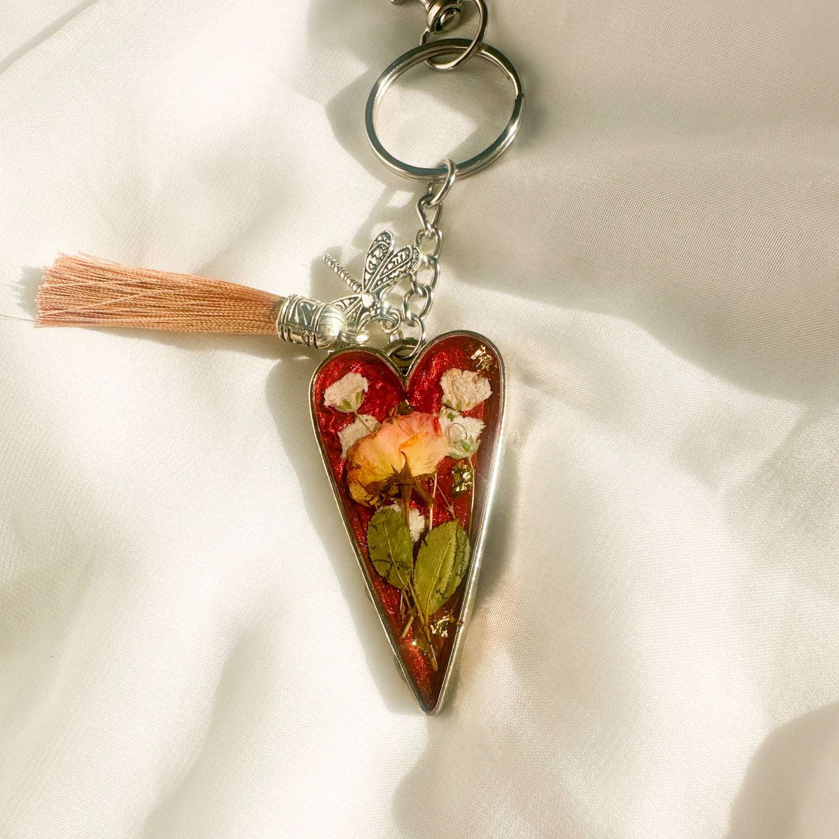 Handcrafted Floral Heart bag charm with real dried flowers and a silk tassel