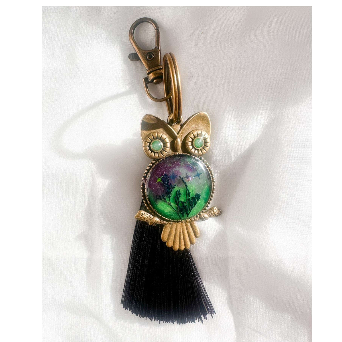 Northern Lights owl keychain with real ferns in resin and black tassel