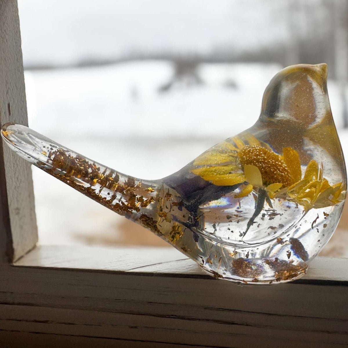 Handcrafted yellow floral resin bird with a real yellow daisy and gold leaf