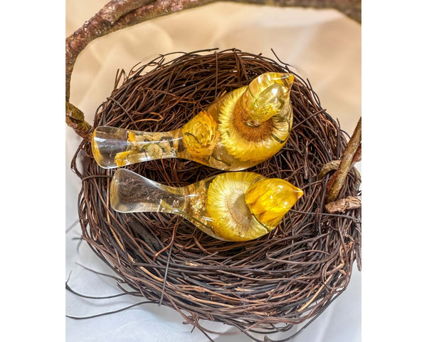 Golden Straw Duo strawflower resin bird pair nestled together in a natural twig nest