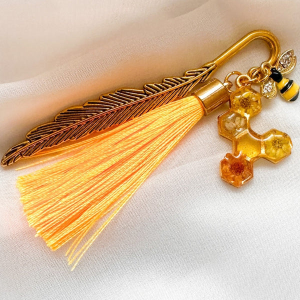 Amber Feather Bookmark honey bee bookmark handmade with gold feather hook, amber honeycomb and orange tassel