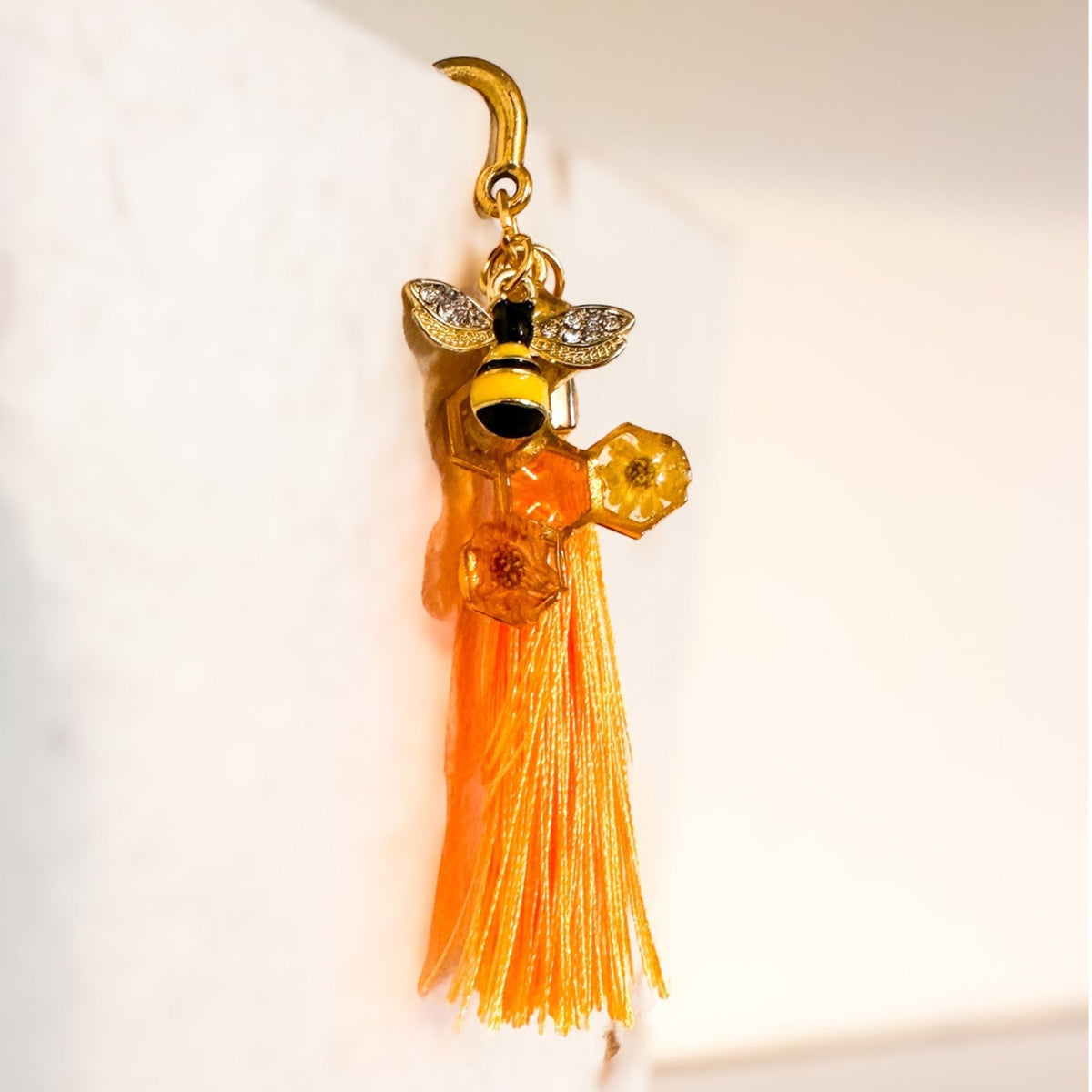 Amber Feather Bookmark honey bee bookmark handmade with gold feather hook, amber honeycomb and orange tassel