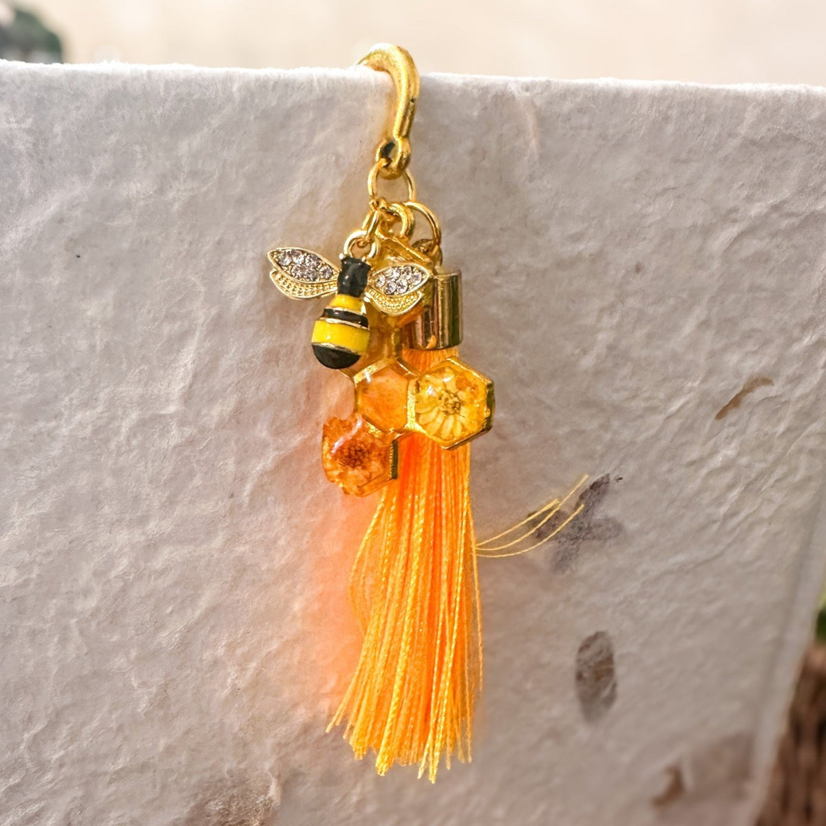 Amber Feather Bookmark honey bee bookmark handmade with gold feather hook, amber honeycomb and orange tassel