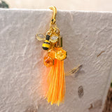 Amber Feather Bookmark honey bee bookmark handmade with gold feather hook, amber honeycomb and orange tassel