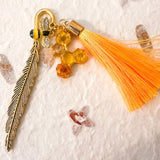Amber Feather Bookmark honey bee bookmark handmade with gold feather hook, amber honeycomb and orange tassel