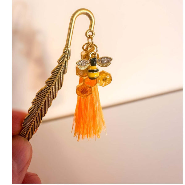 Amber Feather Bookmark honey bee bookmark handmade with gold feather hook, amber honeycomb and orange tassel