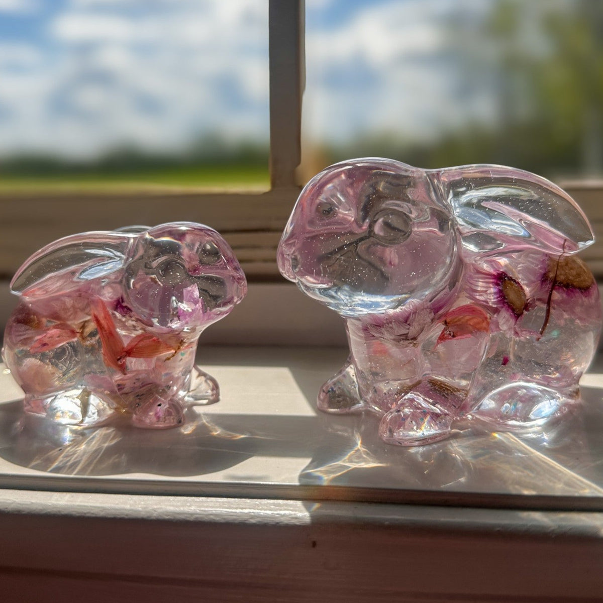 Blossom and Burrow pink floral resin bunny decor with real preserved spring blooms handmade Canada sold as a set of two