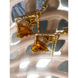 Handmade honey bee drip earrings with gold bee charm & hypoallergenic hooks. One of a kind, made in Cold Lake, Alberta.
