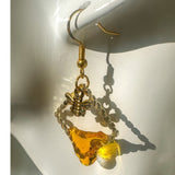 Handmade honey bee drip earrings with gold bee charm & hypoallergenic hooks. One of a kind, made in Cold Lake, Alberta.