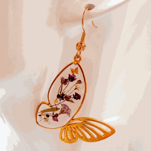 Fluttering Blossom handmade earrings with real pressed flowers encased in resin butterfly wings and dainty butterfly accents
