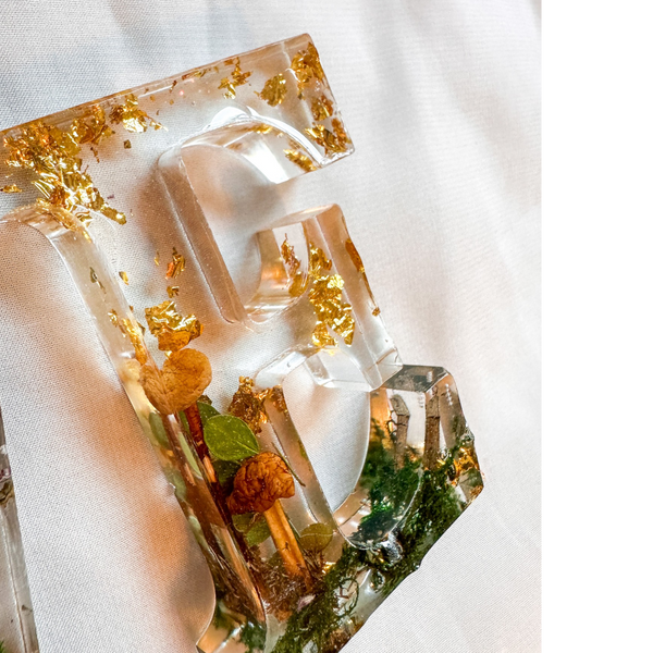 Boreal Mushroom LOVE resin word art with real mushrooms, ferns, moss, and gold leaf accents
