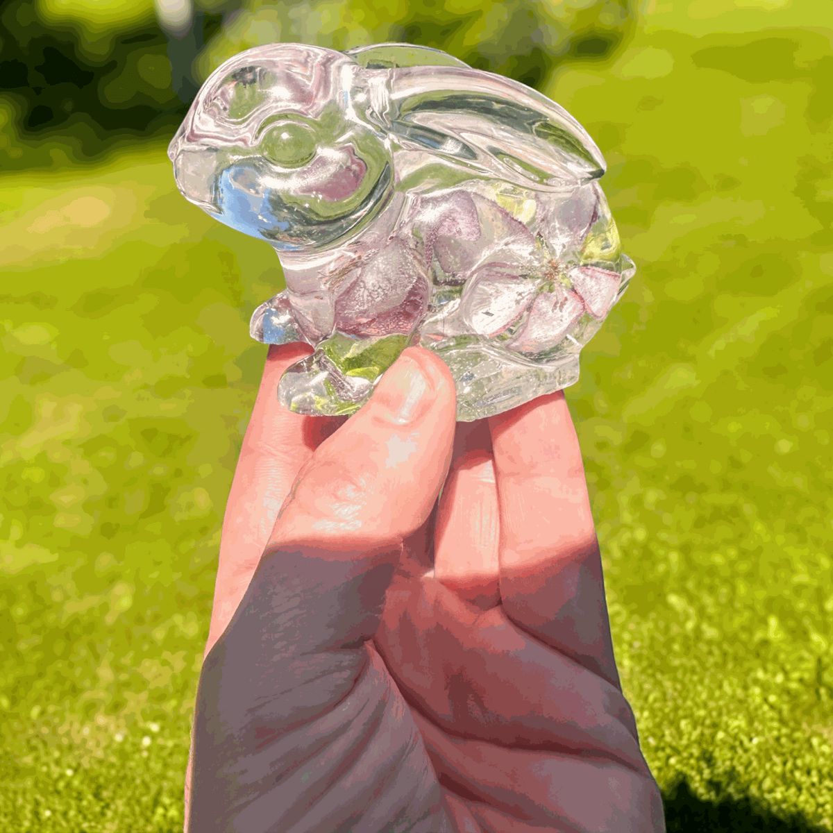 Pair of handmade apple blossom bunnies with real preserved flowers inside clear resin decor