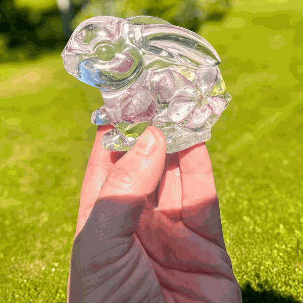 Pair of handmade apple blossom bunnies with real preserved flowers inside clear resin decor