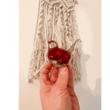 Crimson Meadow Songbird resin decor with preserved deep pink strawflowers and green fern handcrafted in clear resin