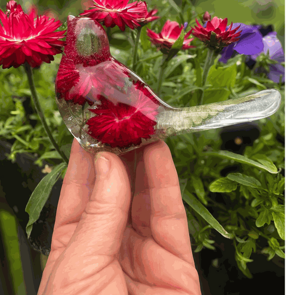 Handmade Crimson Meadow Songbird resin decor with preserved deep pink strawflowers and green fern