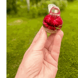 Handmade Crimson Meadow Songbird resin decor with real deep pink strawflowers and green fern inside clear resin