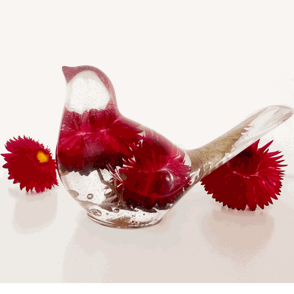 Crimson Meadow Songbird resin decor with preserved pink strawflowers and green fern handcrafted in clear resin