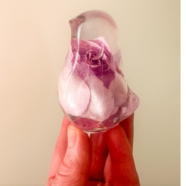 Pink rose resin bird decor with preserved blush rose inside clear resin