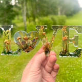 Boreal Mushroom LOVE resin word art with hand-foraged mushrooms, ferns, moss, and gold leaf accents
