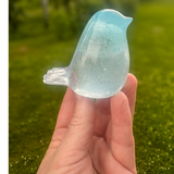 Glow in the dark resin bird decor with real dandelion puff inside glowing blue resin