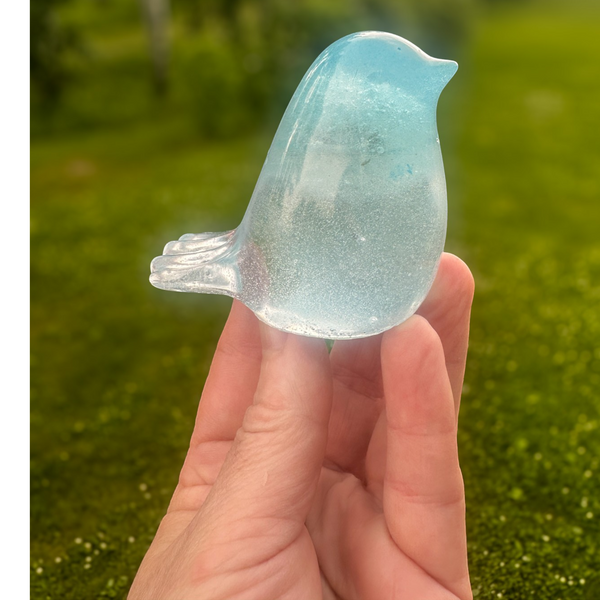 Glow in the dark resin bird decor with real dandelion puff inside glowing blue resin