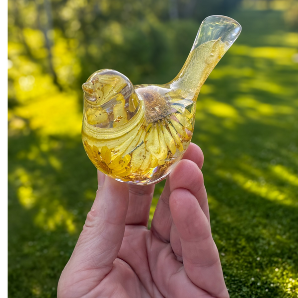 Handcrafted yellow floral resin bird with real daisy and gold leaf accents