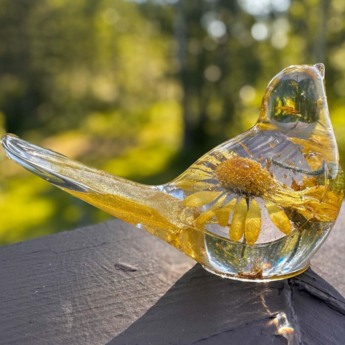 Handcrafted yellow floral daisy resin bird with gold leaf accents and real summer blooms