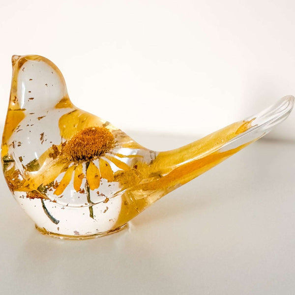 Yellow floral resin bird with real yellow daisy and gold leaf accents