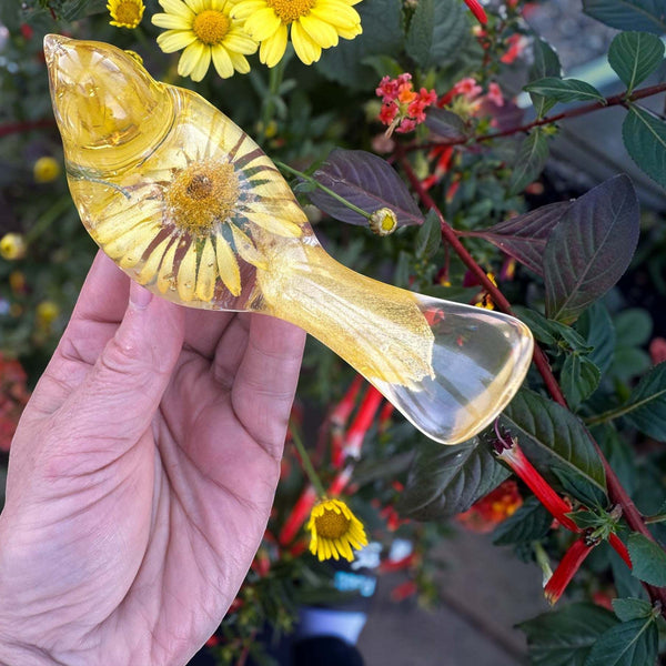 Yellow floral resin bird with real daisy and gold leaf accents