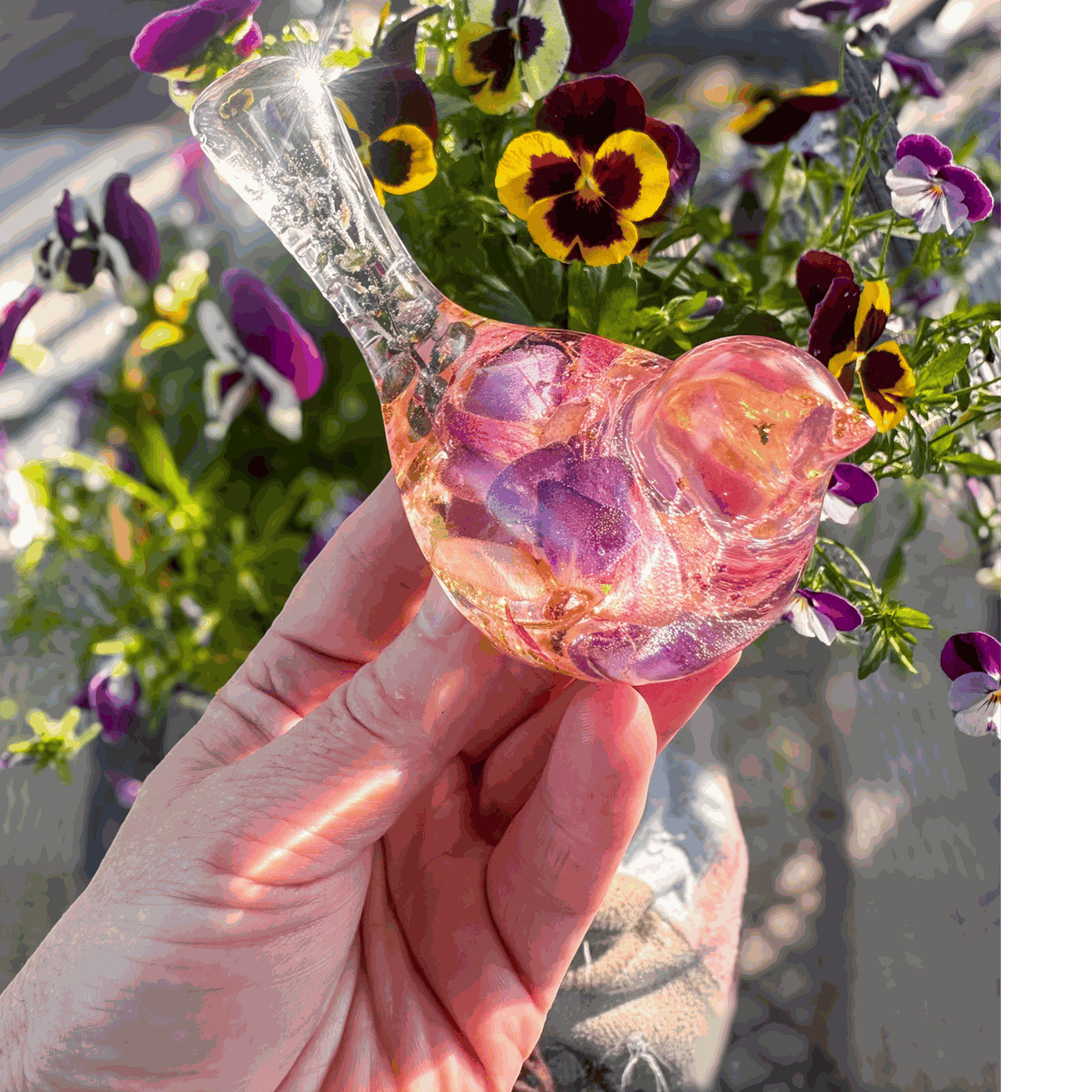 Handmade clear resin bird with real preserved fuchsia flowers and gold leaf accents