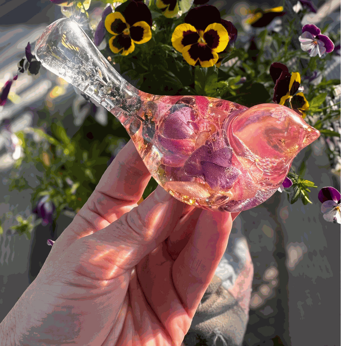 Handmade clear resin bird with real preserved fuchsia flowers and gold leaf accents