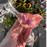 Handmade clear resin bird with real preserved fuchsia flowers and gold leaf accents