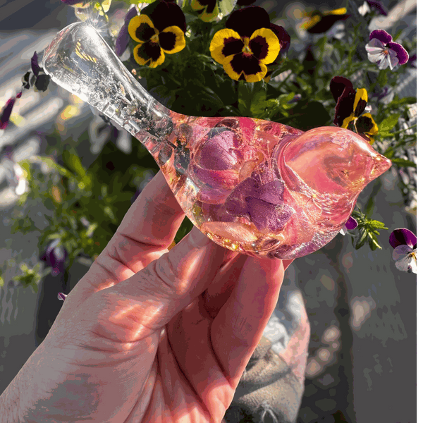 Handmade clear resin bird with real preserved fuchsia flowers and gold leaf accents