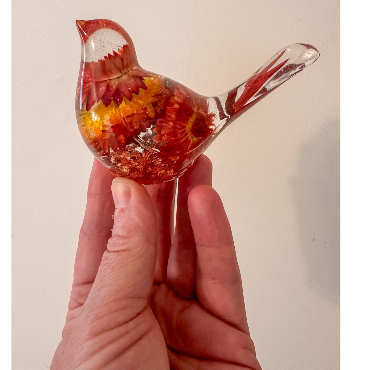 Handcrafted Copper Ember Strawflower songbird with real dried orange strawflowers and copper leaf decor