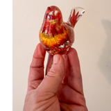 Copper Ember Strawflower resin songbird with real dried orange strawflowers and copper leaf base decor