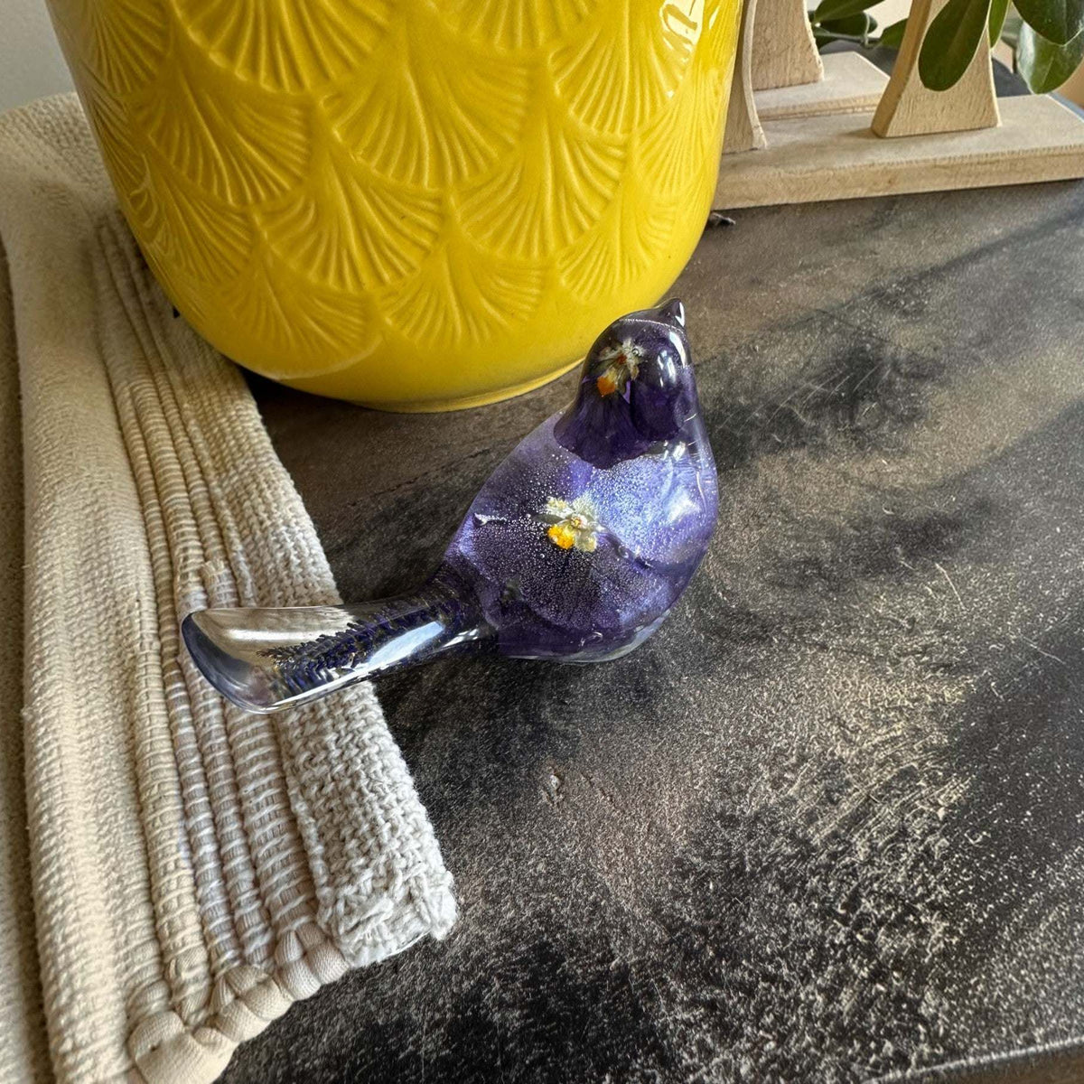 Purple Pansy resin bird decor with real pressed purple pansies and clear resin tail, handcrafted with botanical details.