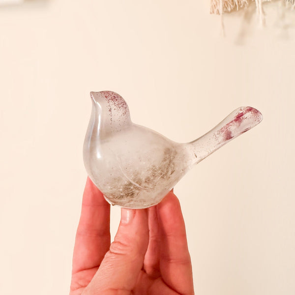 Glow in the Dark Resin Bird, translucent milky resin with violet glitter and a real dandelion puff inside
