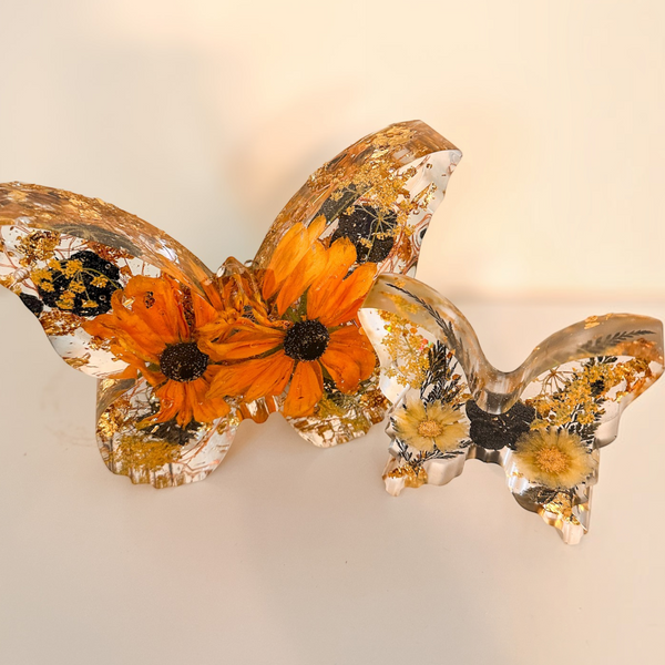 Light up resin butterfly decor set with clear resin, orange flowers, yellow blooms, black accents and gold leaf detailing