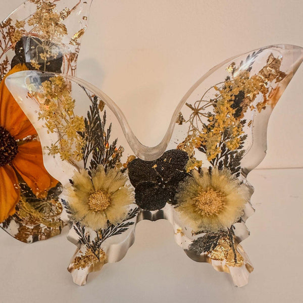 Light up resin butterfly decor set with two clear pieces, pressed yellow flowers, black blooms, foliage and gold leaf
