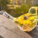 Sunflower Songbird bird decor in clear resin, featuring vivid yellow blooms, lavender in the tail, and gold leaf accents.