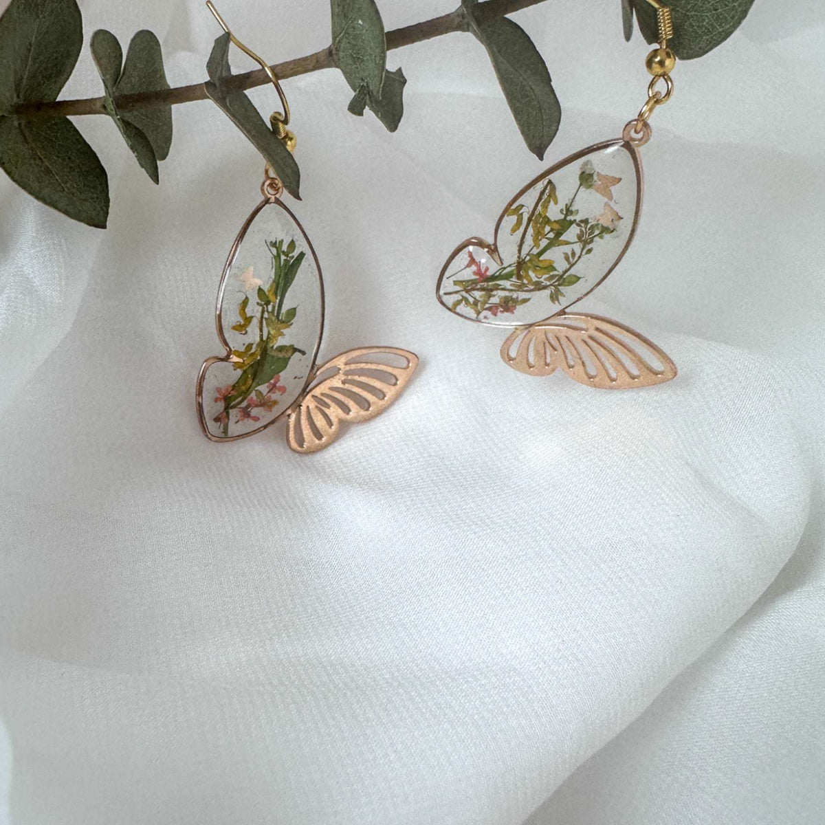 Fluttering Blossom Earrings - Handmade Botanical Resin Butterflies