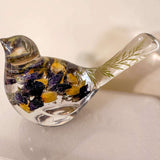 Blue Lupine resin bird decor in clear resin, with deep purple and golden yellow flowers and green botanicals in its tail.