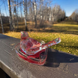 Maple leaf bird and tray set of clear glossy resin, featuring embedded red leaves, gold flecks and a bird-shaped dish.