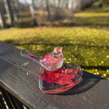 Maple leaf bird and tray set in clear glossy resin, featuring red maple leaves and gold flecks in a heart-shaped tray and bird.